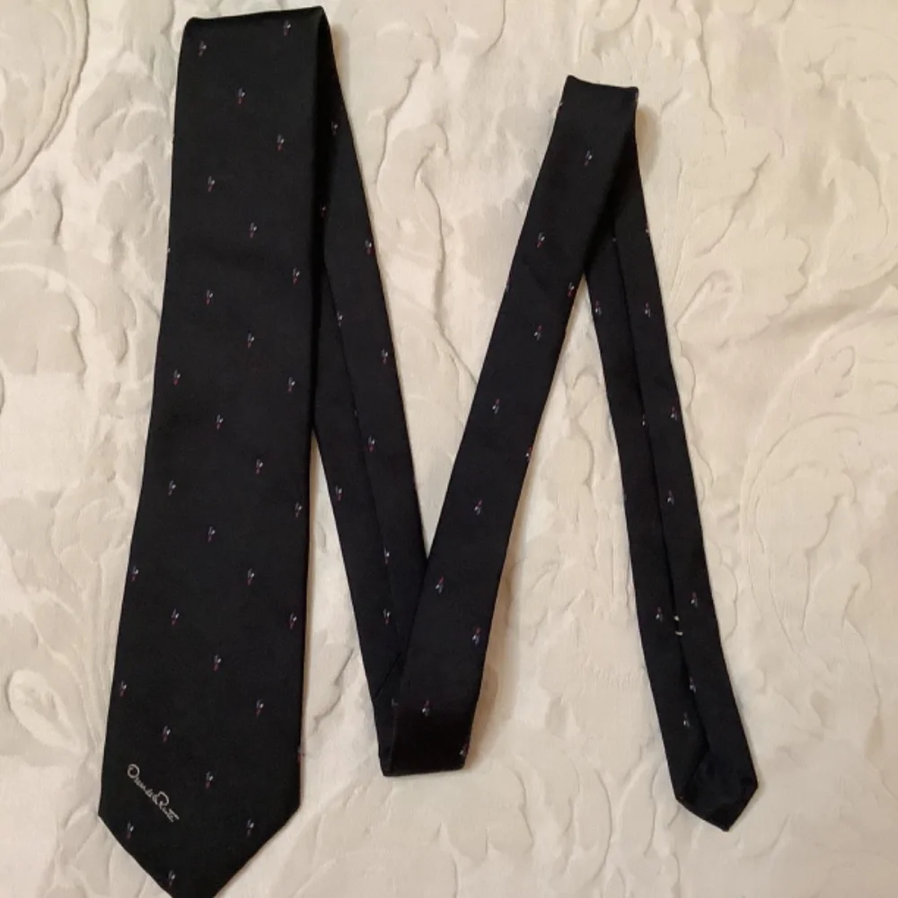 EUC bundle‎ ties Oscar de la Renta & Aigner